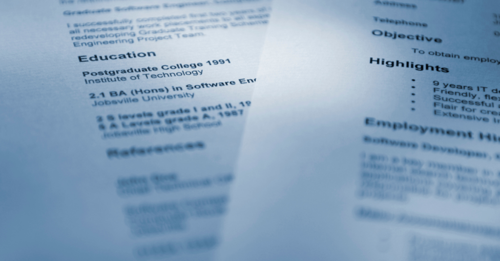 Close-up of resume being optimized for ATS in a job search strategy to get more interviews.