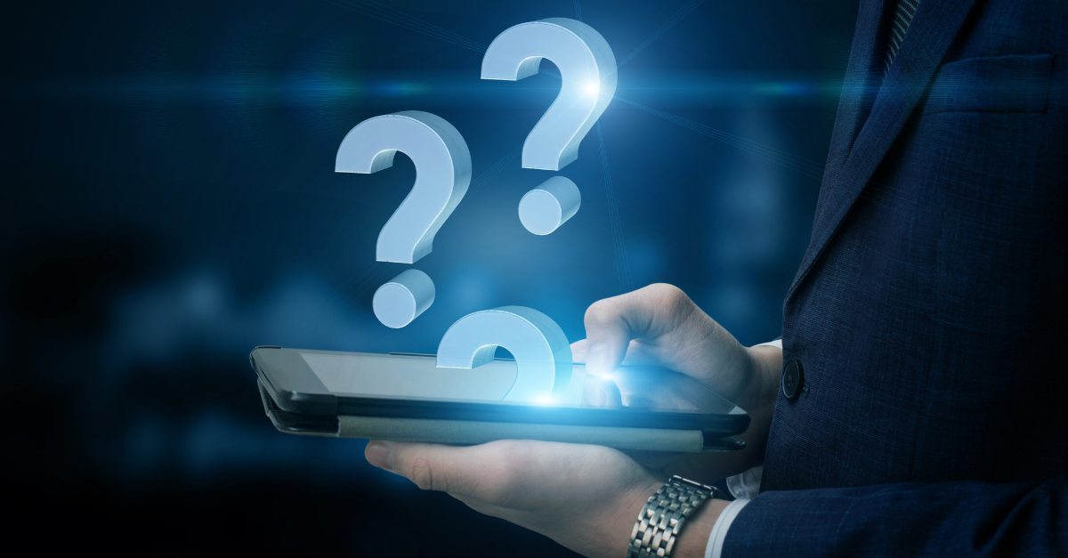 Job interview questions and answers – evaluating common questions on a tablet during interview prep.